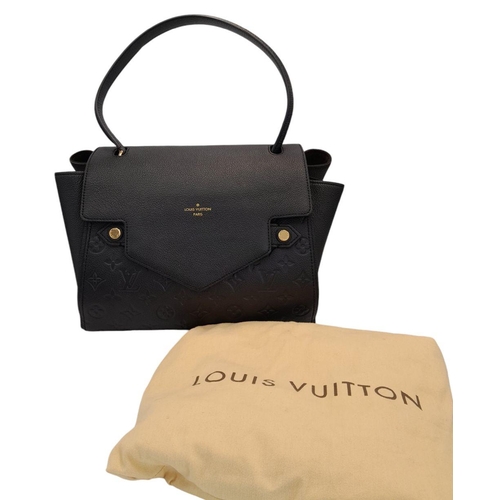 94 - A Louis Vuitton Black Monogram Empreinte Leather Top Handle Bag. Monogram-embossed black leather ext... 