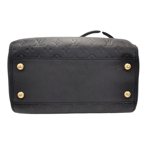 94 - A Louis Vuitton Black Monogram Empreinte Leather Top Handle Bag. Monogram-embossed black leather ext... 