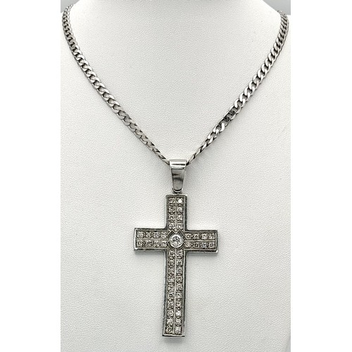 480 - A Serious 9k White Gold Diamond Encrusted Cross on a 9K White Gold Curb Chain. Cross - 7cm x 4cm. Ch... 