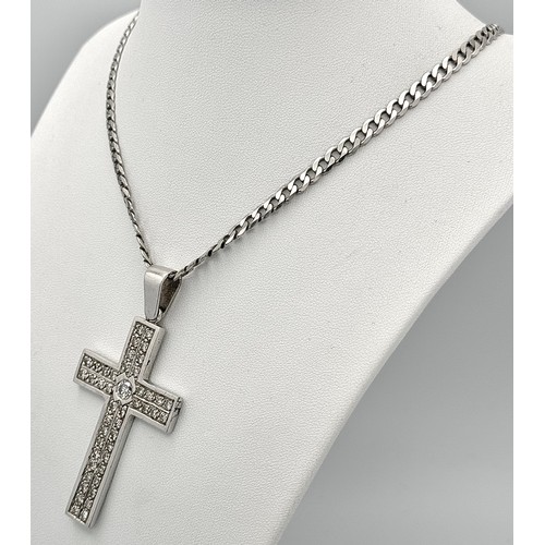 480 - A Serious 9k White Gold Diamond Encrusted Cross on a 9K White Gold Curb Chain. Cross - 7cm x 4cm. Ch... 