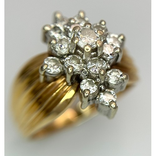 170 - A 14K Yellow Gold Diamond Cluster Ring. Fifteen round and brilliant round cut diamonds - 0.50ctw in ... 