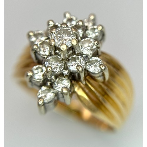 170 - A 14K Yellow Gold Diamond Cluster Ring. Fifteen round and brilliant round cut diamonds - 0.50ctw in ... 