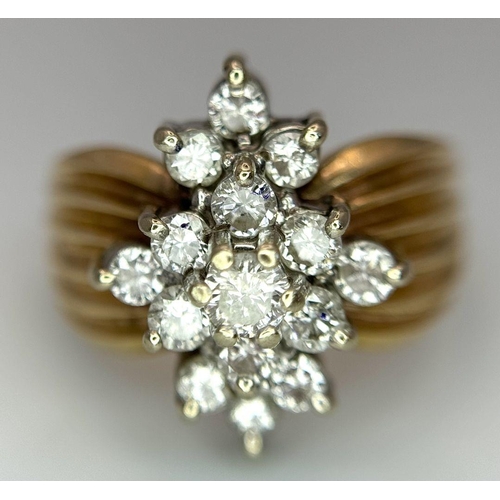 170 - A 14K Yellow Gold Diamond Cluster Ring. Fifteen round and brilliant round cut diamonds - 0.50ctw in ... 