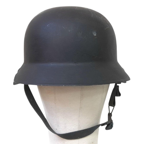 1338 - A Repainted German Army Parade Helmet with Original Liner.