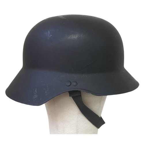 1338 - A Repainted German Army Parade Helmet with Original Liner.