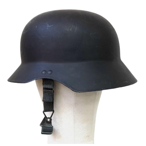 1338 - A Repainted German Army Parade Helmet with Original Liner.