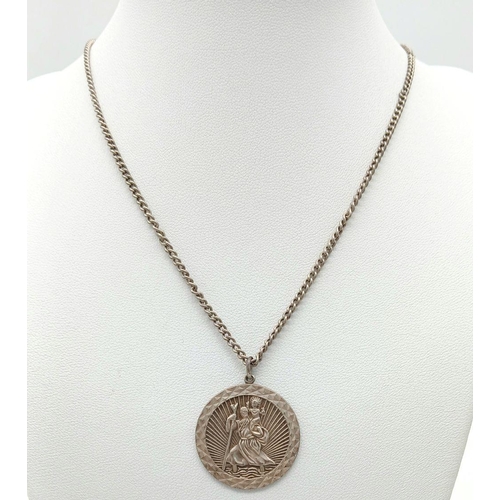 1541 - A vintage sterling silver St Christopher pendant on silver chain. Total weight 14.15G. Total length ... 