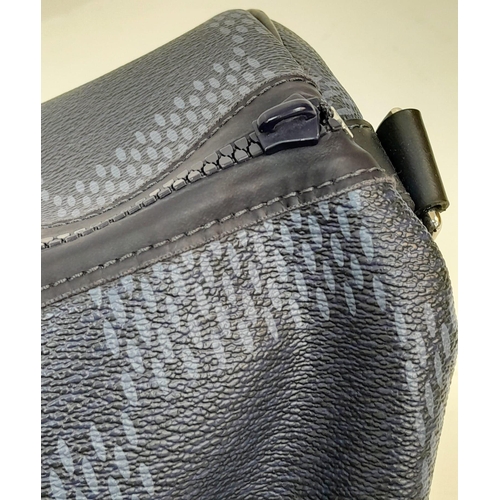 16 - A Louis Vuitton America's Cup Oversized Keepall. Damier canvas in dark blue with a 'V' Gaston logo -... 