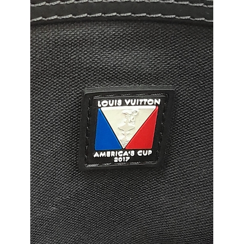 16 - A Louis Vuitton America's Cup Oversized Keepall. Damier canvas in dark blue with a 'V' Gaston logo -... 