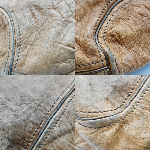 220 - A Givenchy Brown Eclipse Hobo Bag. Leather exterior, gold-toned hardware, adjustable handle strap, o... 