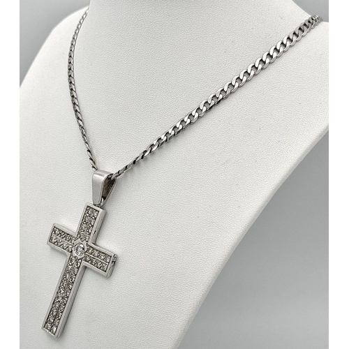 613 - A Serious 9k White Gold Diamond Encrusted Cross on a 9K White Gold Curb Chain. Cross - 7cm x 4cm. Ch... 