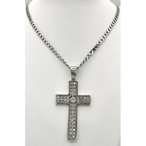 613 - A Serious 9k White Gold Diamond Encrusted Cross on a 9K White Gold Curb Chain. Cross - 7cm x 4cm. Ch... 