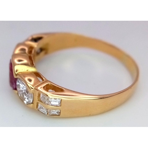 149 - An 18K Yellow Gold (tested) Pink Sapphire and Diamond Ring. A 0.70ct oval mixed cut natural pink sap... 