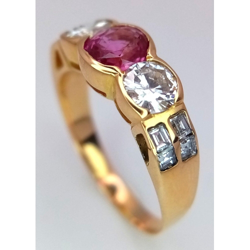 149 - An 18K Yellow Gold (tested) Pink Sapphire and Diamond Ring. A 0.70ct oval mixed cut natural pink sap... 