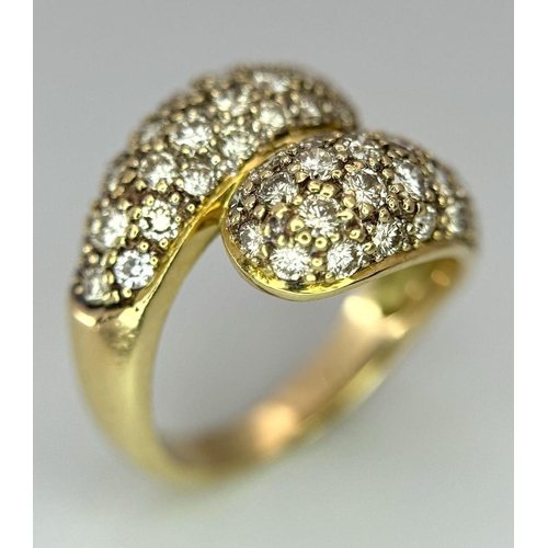 156 - An 18K Yellow Gold Diamond Wrap Ring. 1.50ctw round brilliant cut natural diamonds - colour I - J, c... 