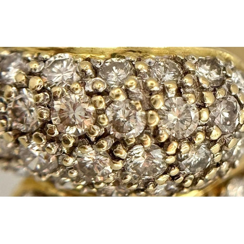 156 - An 18K Yellow Gold Diamond Wrap Ring. 1.50ctw round brilliant cut natural diamonds - colour I - J, c... 