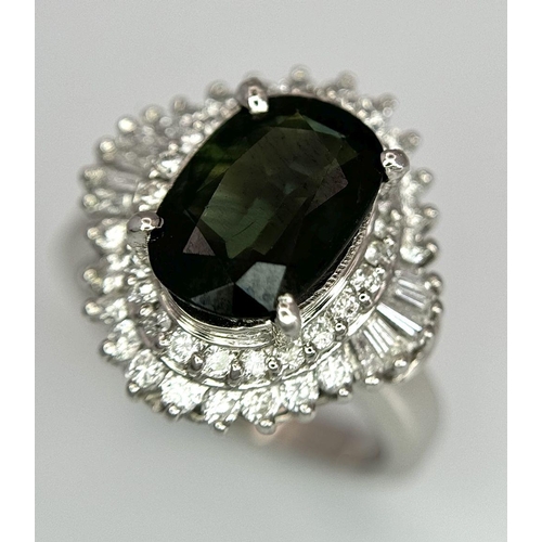 170 - A 900 Platinum Green Sapphire with Diamond Surround Dress Ring. A 2.11ct cushion mixed cut green sap... 