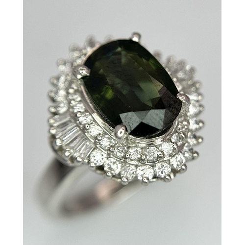 170 - A 900 Platinum Green Sapphire with Diamond Surround Dress Ring. A 2.11ct cushion mixed cut green sap... 