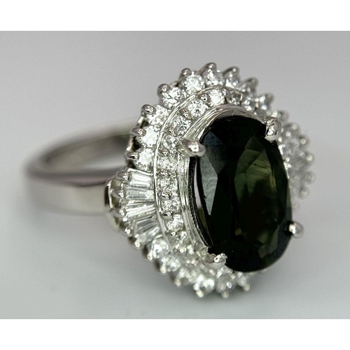 170 - A 900 Platinum Green Sapphire with Diamond Surround Dress Ring. A 2.11ct cushion mixed cut green sap... 