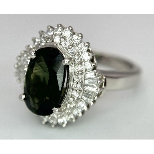 170 - A 900 Platinum Green Sapphire with Diamond Surround Dress Ring. A 2.11ct cushion mixed cut green sap... 