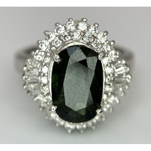 170 - A 900 Platinum Green Sapphire with Diamond Surround Dress Ring. A 2.11ct cushion mixed cut green sap... 