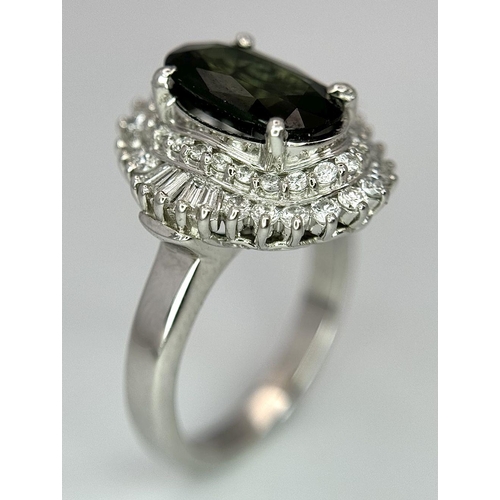 170 - A 900 Platinum Green Sapphire with Diamond Surround Dress Ring. A 2.11ct cushion mixed cut green sap... 