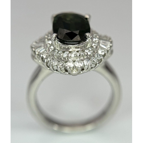 170 - A 900 Platinum Green Sapphire with Diamond Surround Dress Ring. A 2.11ct cushion mixed cut green sap... 