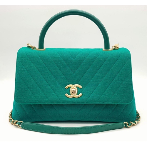 599 - A Chanel Coco Handle Cloth Handbag in Green Chevron Canvas. Chevron canvas exterior with gold-toned ... 