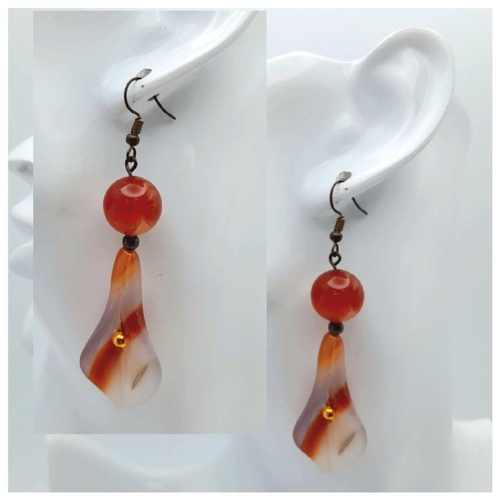 140 - A vintage carnelian necklace and earrings set with carved Arum lilies pendants (often cale Cala lili... 