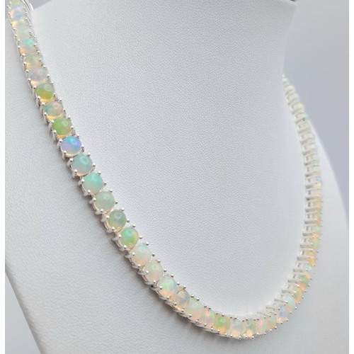 148 - An Ethiopian Fire Opal Tennis Necklace - set in 925 Silver. CD-1489. 45cm length.