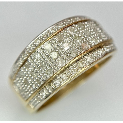 165 - A 9K YELLOW GOLD DIAMOND RING. 5 ROW GEOMETRIC PATTERN. 0.50CTW. 4.7G. SIZE P. SP3006.