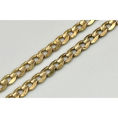 17 - A 9K Yellow Gold Flat Curb Link Chain. 44cm length. 10.9g weight.