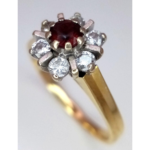 193 - AN 18K YELLOW GOLD DIAMOND AND RED STONE RING. 0.20CT. 3.4G. SIZE K. SC3064.