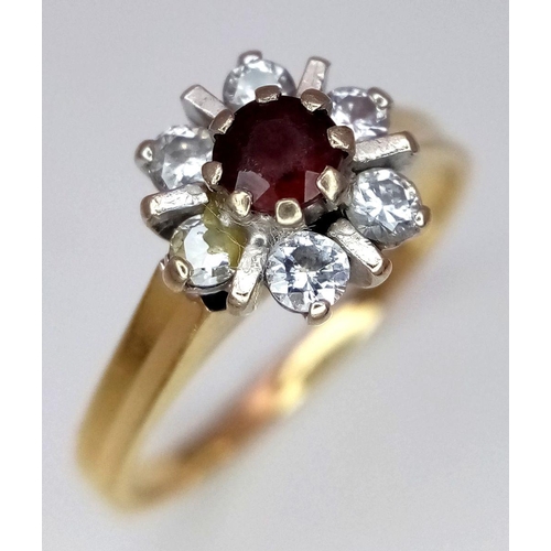 193 - AN 18K YELLOW GOLD DIAMOND AND RED STONE RING. 0.20CT. 3.4G. SIZE K. SC3064.