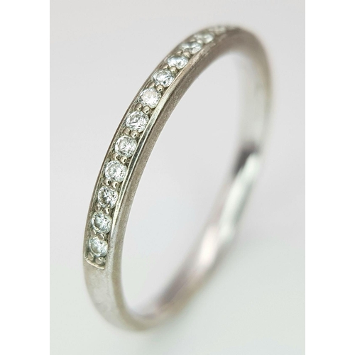 200 - AN 18K WHITE GOLD DIAMOND SET BAND RING - 0.20CTW. 2.5G. SIZE O. A/S 1153.