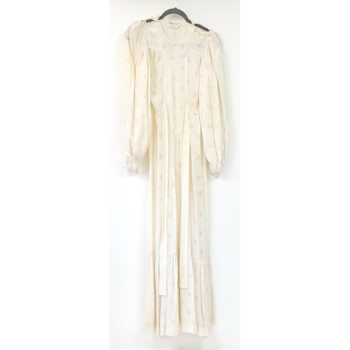 205 - A Vintage ivory Ossie Clark floor length dress, heart details to the fabric, clothed buttons to fast... 