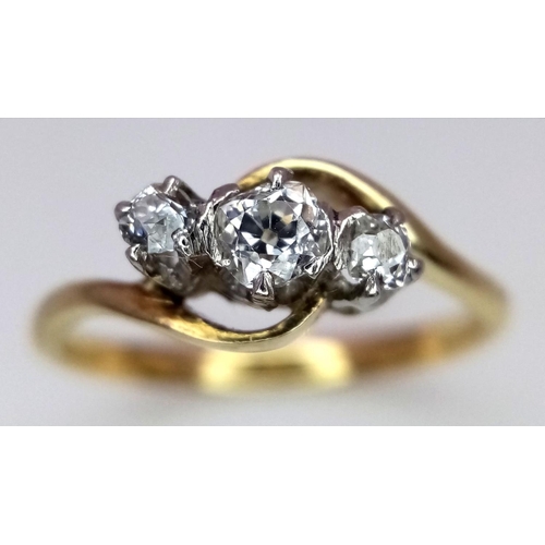 207 - AN 18K YELLOW GOLD, PLATINUM ( TESTED ) OLD CUT DIAMOND 3 STONE TWIST RING. 0.20CTW. 2.2G. SIZE K. A... 