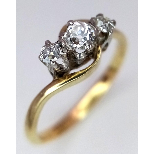 207 - AN 18K YELLOW GOLD, PLATINUM ( TESTED ) OLD CUT DIAMOND 3 STONE TWIST RING. 0.20CTW. 2.2G. SIZE K. A... 