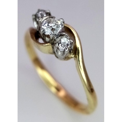 207 - AN 18K YELLOW GOLD, PLATINUM ( TESTED ) OLD CUT DIAMOND 3 STONE TWIST RING. 0.20CTW. 2.2G. SIZE K. A... 