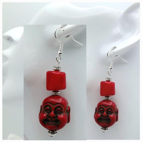 210 - A substantial, chunky, Pacific red coral necklace and earrings set with smiling Buddha head pendants... 