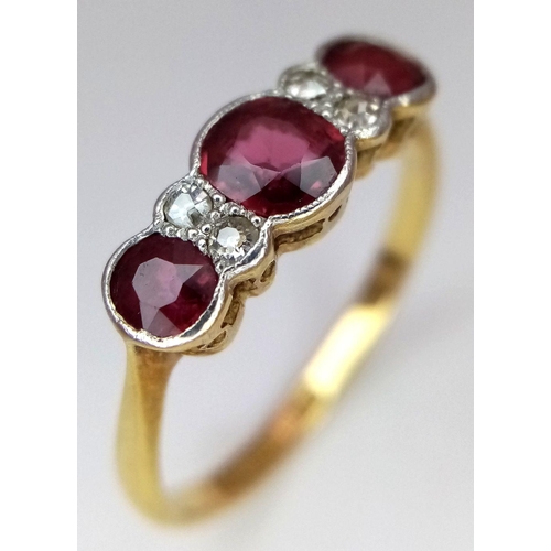 221 - AN 18K YELLOW GOLD AND PLATINUM VINTAGE DIAMOND & RUBY RING. 2.1G. SIZE O. JR19N.