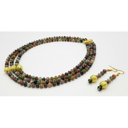 224 - A fascinating three strand necklace with multi-coloured, faceted, round Malaysian Jade beads with go... 