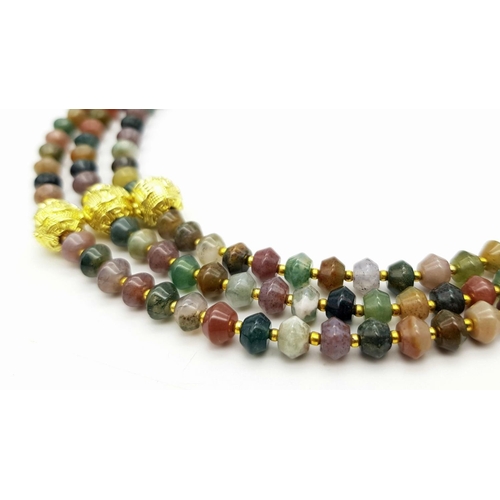 224 - A fascinating three strand necklace with multi-coloured, faceted, round Malaysian Jade beads with go... 
