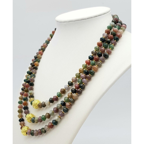 224 - A fascinating three strand necklace with multi-coloured, faceted, round Malaysian Jade beads with go... 