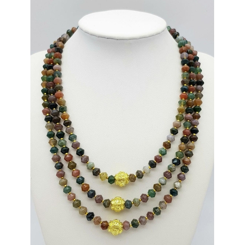 224 - A fascinating three strand necklace with multi-coloured, faceted, round Malaysian Jade beads with go... 