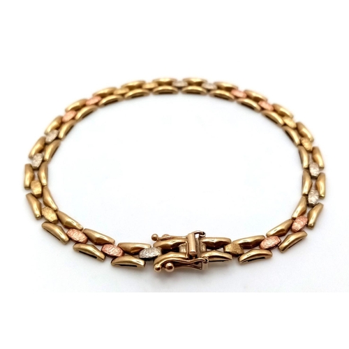 24 - A 9K Tri-Coloured Gold Italian Fancy Link Bracelet. 18cm. 6.85g weight.