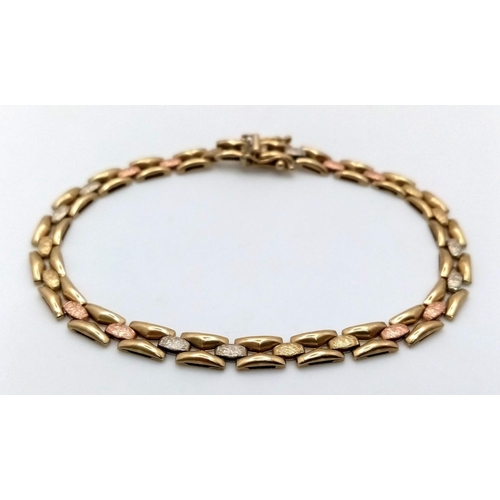 24 - A 9K Tri-Coloured Gold Italian Fancy Link Bracelet. 18cm. 6.85g weight.