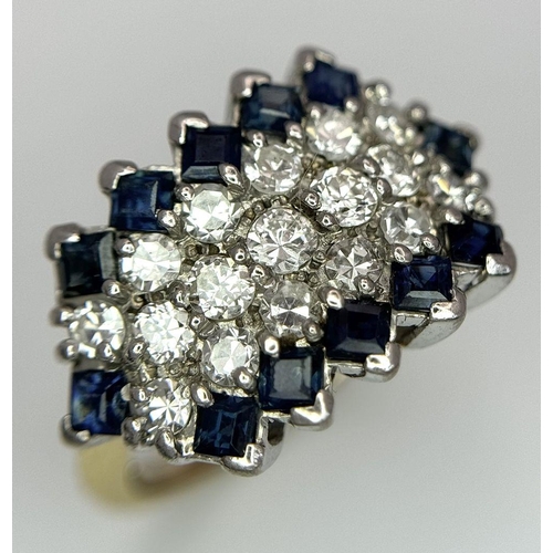 33 - AN 18K YELLOW GOLD, DIAMOND AND SAPPHIRE RING. 1CTW OF DIAMONDS AND 0.80CTW OF SAPPHIRES. 5.7G. SIZE... 