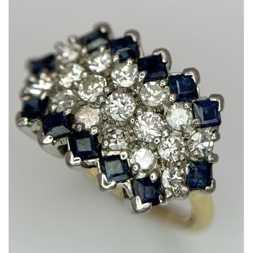 33 - AN 18K YELLOW GOLD, DIAMOND AND SAPPHIRE RING. 1CTW OF DIAMONDS AND 0.80CTW OF SAPPHIRES. 5.7G. SIZE... 