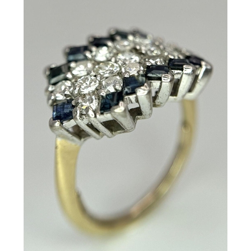 33 - AN 18K YELLOW GOLD, DIAMOND AND SAPPHIRE RING. 1CTW OF DIAMONDS AND 0.80CTW OF SAPPHIRES. 5.7G. SIZE... 